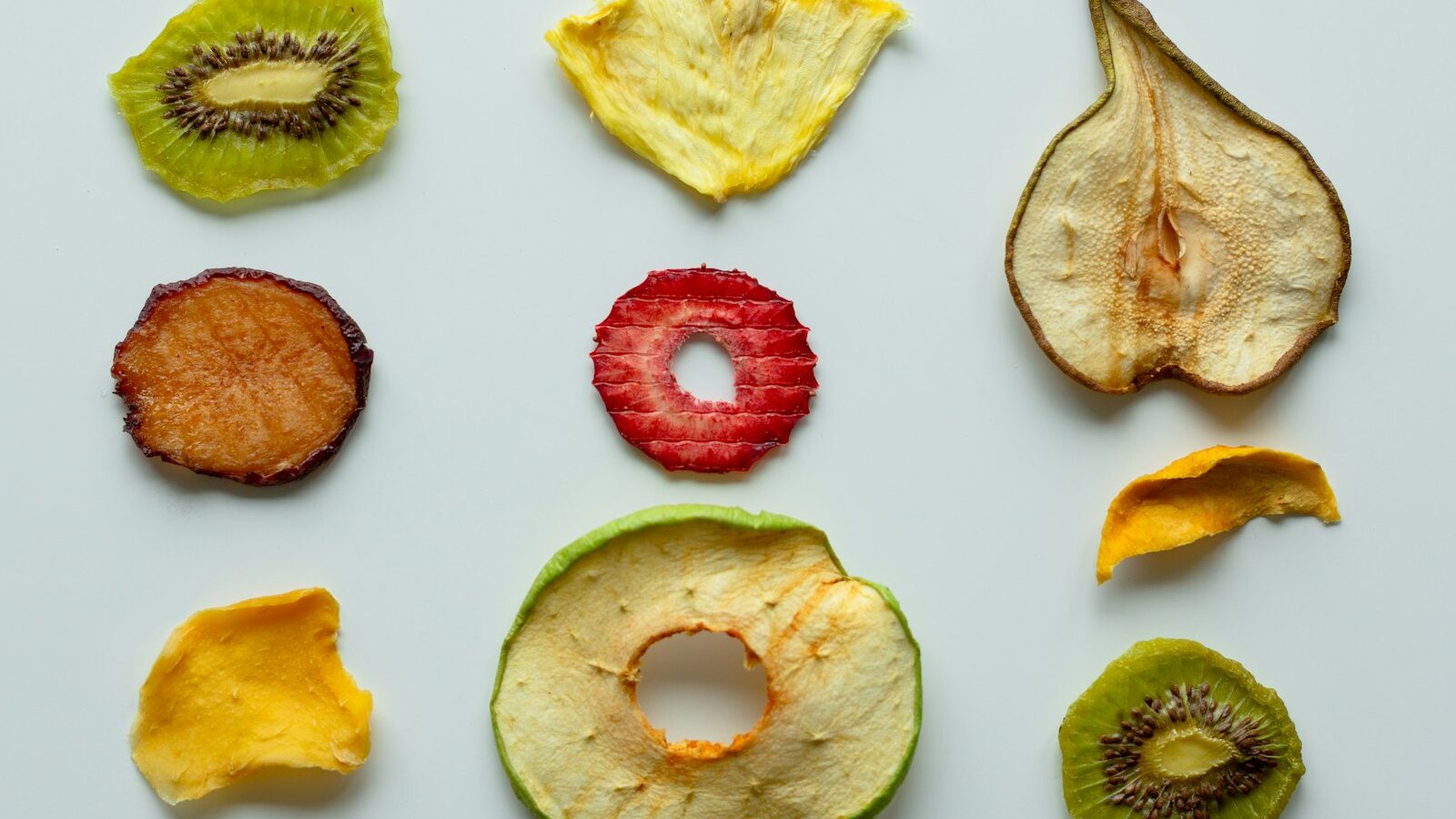 sliced apple and red round fruit