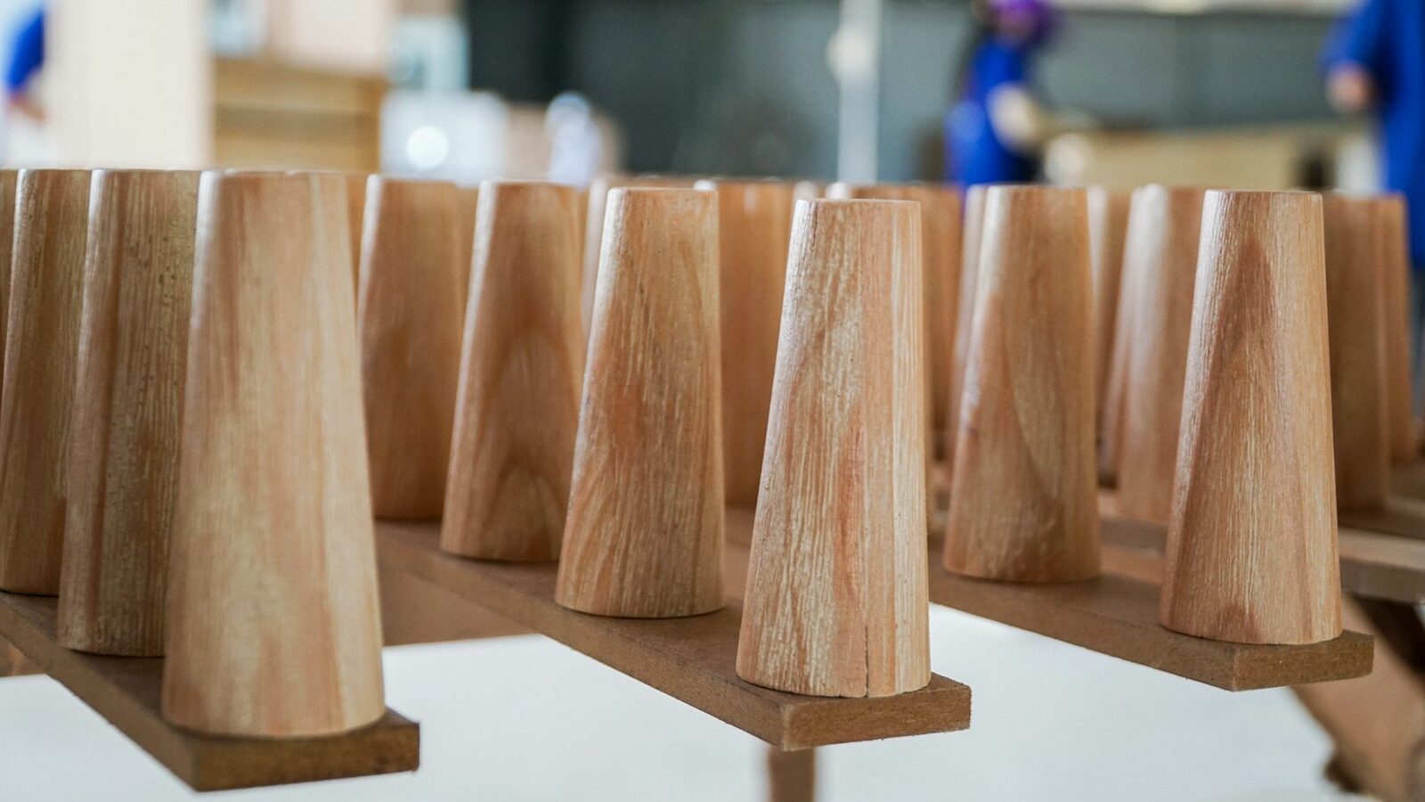 a group of wooden cones sitting on top of a table