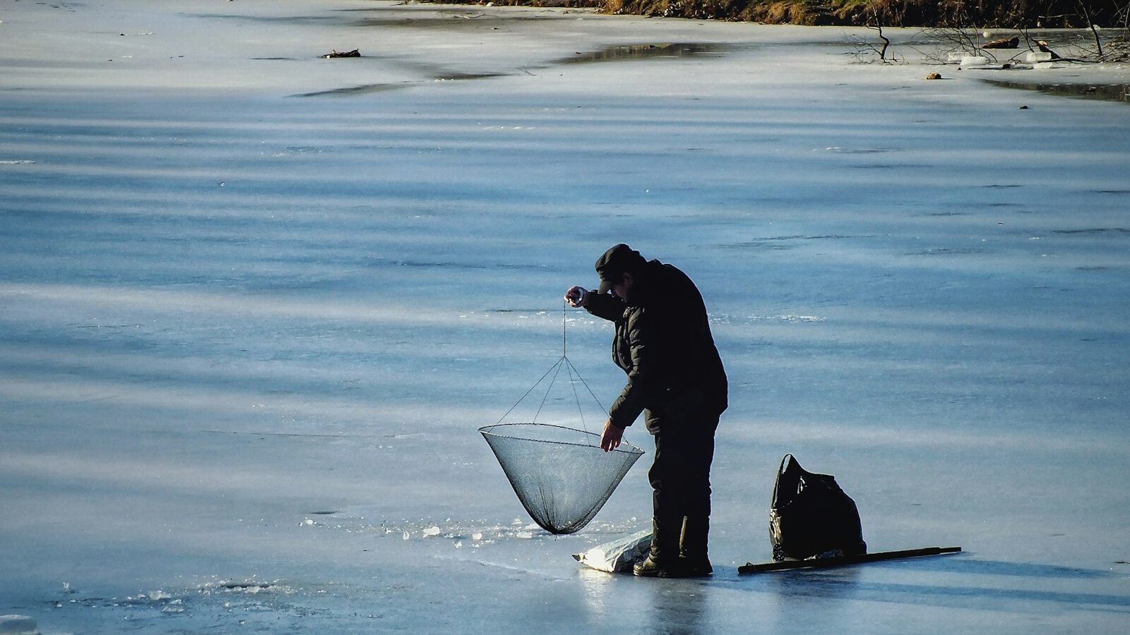 man catchin fish