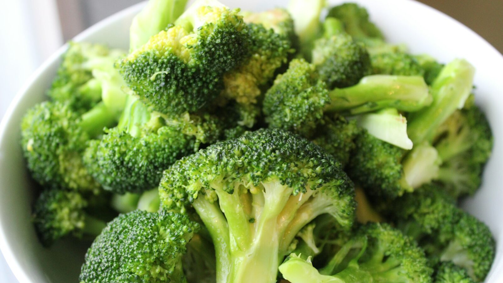 green broccoli on white ceramic plate