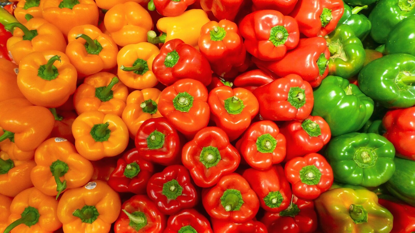 orange bell peppers on white ceramic plate