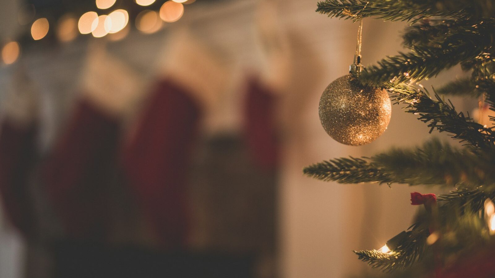 closeup photo of baubles on christmas tree