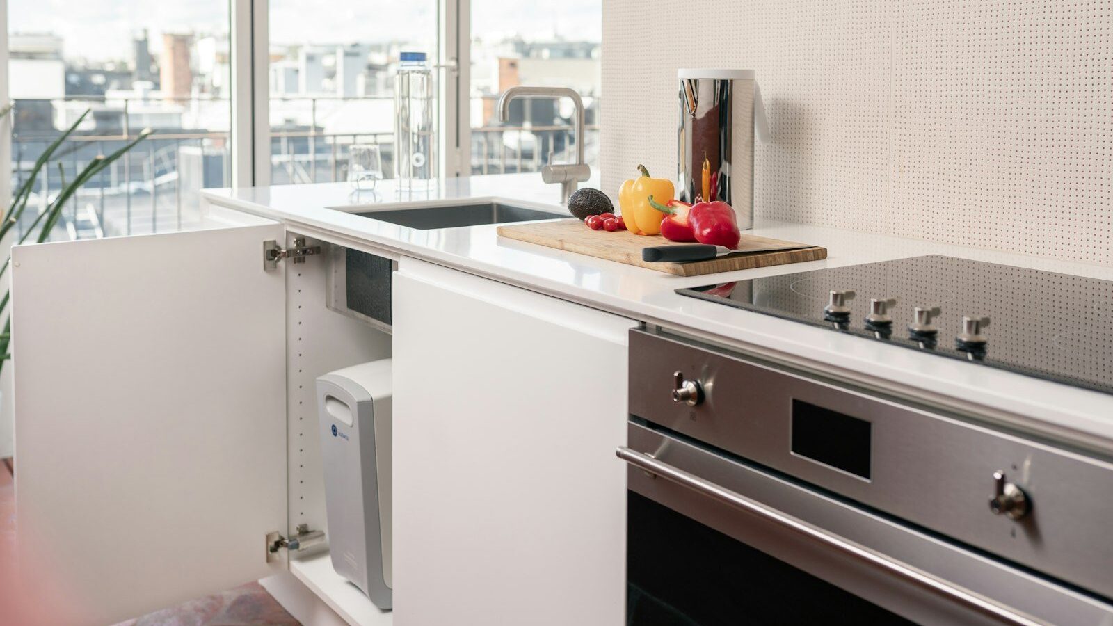 a kitchen with a sink and a stove